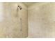 Walk-in shower features attractive tile work and a grab bar for safety at 318 Winding Brook Ln # 104, Bradenton, FL 34212