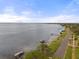 Stunning waterfront property with private dock, showcasing tranquil waters and coastal living at 346 Suwanee Ave, Sarasota, FL 34243