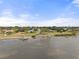 An aerial view showcasing the neighborhood's proximity to the water and several docks at 346 Suwanee Ave, Sarasota, FL 34243