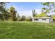 Spacious backyard primarily covered in grass at 346 Suwanee Ave, Sarasota, FL 34243