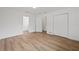 Bright, spacious bedroom with wood-look flooring and white walls at 346 Suwanee Ave, Sarasota, FL 34243