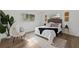 Relaxing bedroom with natural light, a comfy bed, and tasteful accents at 346 Suwanee Ave, Sarasota, FL 34243
