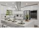 Bright, updated kitchen featuring a center island, stainless steel appliances, and white cabinetry at 346 Suwanee Ave, Sarasota, FL 34243