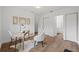 Inviting home office space with a desk, stylish chair, and access to a bathroom at 346 Suwanee Ave, Sarasota, FL 34243