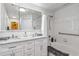 Bathroom with double vanity and bathtub at 4106 Central Sarasota Pkwy # 1013, Sarasota, FL 34238