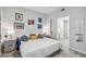 Spacious bedroom with large bed and en-suite bathroom at 4106 Central Sarasota Pkwy # 1013, Sarasota, FL 34238