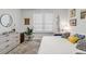 Serene bedroom with king-size bed and large window at 4106 Central Sarasota Pkwy # 1013, Sarasota, FL 34238