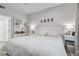 Bright bedroom with king-size bed and white decor at 4106 Central Sarasota Pkwy # 1013, Sarasota, FL 34238