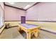 Game room featuring a billiard table and purple walls at 4106 Central Sarasota Pkwy # 1013, Sarasota, FL 34238