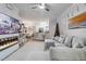 Living area with sectional sofa and view into kitchen and dining area at 4106 Central Sarasota Pkwy # 1013, Sarasota, FL 34238
