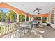 Relaxing community patio area with tables and chairs at 4106 Central Sarasota Pkwy # 1013, Sarasota, FL 34238