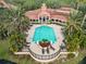 Community pool with lounge chairs at 4106 Central Sarasota Pkwy # 1013, Sarasota, FL 34238