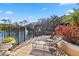 Relaxing lounge chairs by the lake at 4106 Central Sarasota Pkwy # 1013, Sarasota, FL 34238