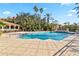 Large community pool with plenty of lounge chairs at 4106 Central Sarasota Pkwy # 1013, Sarasota, FL 34238