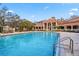 Inviting community swimming pool with ample deck space at 4106 Central Sarasota Pkwy # 1013, Sarasota, FL 34238