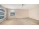 Spacious bedroom with large windows and plush carpeting at 4304 Camino Madera, Sarasota, FL 34238
