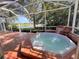 Relaxing hot tub on the screened patio with scenic views at 4304 Camino Madera, Sarasota, FL 34238