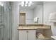 Clean bathroom with granite countertop and walk-in shower at 4621 Gulf Of Mexico Dr # 16B, Longboat Key, FL 34228