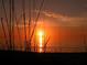 Stunning sunset view over the ocean horizon at 4621 Gulf Of Mexico Dr # 16B, Longboat Key, FL 34228