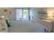 Spacious main bedroom with sliding glass door to private balcony at 4705 5Th W St # 306, Bradenton, FL 34207