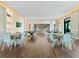 Spacious game room with tables, chairs, and multiple flat screen TVs at 4925 Surfside Cir, Bradenton, FL 34211
