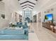 Bright and airy lobby featuring high ceilings, marble floors, and stylish, comfortable seating at 4925 Surfside Cir, Bradenton, FL 34211