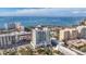 Aerial view of a modern high rise building near the water at 540 N Tamiami Trl # 604, Sarasota, FL 34236