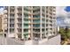 Upscale high-rise building with large balconies and rooftop terrace at 540 N Tamiami Trl # 604, Sarasota, FL 34236