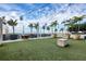 Landscaped rooftop terrace with artificial turf and seating at 540 N Tamiami Trl # 604, Sarasota, FL 34236