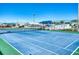 Community tennis court with green and blue surface at 55 Starboard Dr, Venice, FL 34285