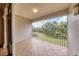 Relaxing screened-in patio with a view of lush greenery at 5581 Key West Pl # 5581, Bradenton, FL 34203