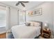 Cozy bedroom features bright natural lighting and comfortable decor at 609 Colonial Bay Dr, Nokomis, FL 34275