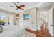 Spacious main bedroom featuring built in entertainment center and a large outdoor balcony at 609 Colonial Bay Dr, Nokomis, FL 34275