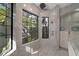 Large walk-in shower with multiple shower heads at 6809 Belmont Ct, Lakewood Ranch, FL 34202