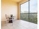 Spacious screened balcony overlooking lush greenery at 7702 Lake Vista Ct # 306, Lakewood Ranch, FL 34202