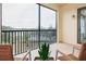 Relaxing screened balcony overlooking lake view at 7702 Lake Vista Ct # 306, Lakewood Ranch, FL 34202