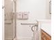 Accessible bathroom with walk-in shower and grab bars at 7702 Lake Vista Ct # 306, Lakewood Ranch, FL 34202