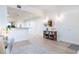 Light and airy entryway with wood floors at 7702 Lake Vista Ct # 306, Lakewood Ranch, FL 34202