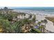 Elevated view of a beachfront resort with a pool and beach access at 915 Seaside Dr # 613 Weeks 4-5, Sarasota, FL 34242