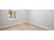 Cozy bedroom with beautiful flooring and a sunny window at 9153 Radiant Cir, Sarasota, FL 34241