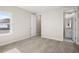 Bedroom with carpet floors and a window with views of the surrounding area at 9153 Radiant Cir, Sarasota, FL 34241