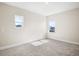 Bright bedroom with two windows offering neighborhood views at 9153 Radiant Cir, Sarasota, FL 34241