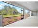 Enjoy the outdoors from this screened lanai overlooking a beautiful yard at 9153 Radiant Cir, Sarasota, FL 34241