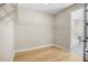 Walk in closet with wood flooring and wire racks for storage at 9153 Radiant Cir, Sarasota, FL 34241