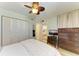 Well-lit bedroom, full-size bed, and convenient dresser at 141 Wild Palm Dr, Bradenton, FL 34210