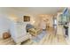 Comfortable living room with light wood floors and plush seating at 141 Wild Palm Dr, Bradenton, FL 34210