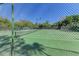Well-maintained tennis court, ready for a game at 141 Wild Palm Dr, Bradenton, FL 34210