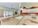 Kitchen boasts a breakfast bar and white cabinetry at 1605 21St W Ave, Palmetto, FL 34221