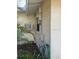 View of exterior wall, window, and AC unit at 1613 Alton Rd, Venice, FL 34293