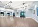 Large dance studio with wood flooring and mirrors at 17714 Waterville Pl, Bradenton, FL 34202